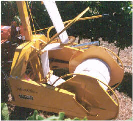 "NetWizz High Lift Swivel Head Auto Tension" is a machine for applying and removing Bird, Hail & Exclusion netting for orchards and anywhere crop cover is required. Netting is wound onto a simple spindle in an inter-woven pattern like a roll of twine.